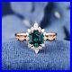 14K-Rose-Gold-Solid-Emerald-Ring-For-Her-Moissanite-Studded-Band-Art-Deco-Design-01-hkb